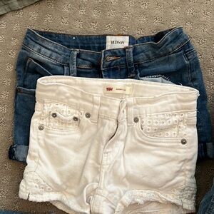 White Levi shorts size 7. Blue jean Hudson shorts size 8